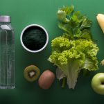 assorted fruits and vegetables on green surface